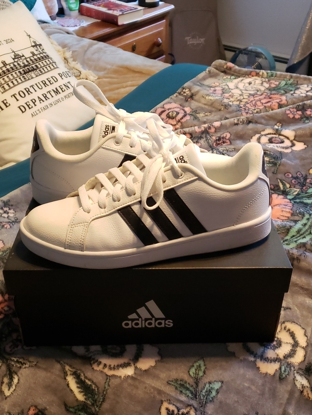 Adidas White Low-Top Sneakers with Classic Three Black Stripes
